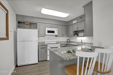 Welcome to your coastal retreat at Shipwatch Villas-where