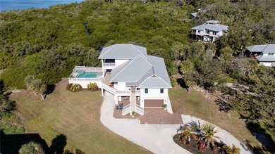 STUNNING COASTAL RETREAT WITH TWO BUILDABLE LOTS & GORGEOUS