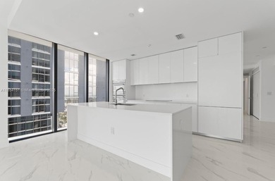 Welcome to luxury living in the sky! This brand-new corner unit