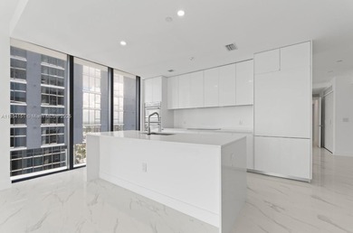 Welcome to luxury living in the sky! This brand-new corner unit