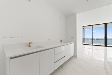 Welcome to luxury living in the sky! This brand-new corner unit