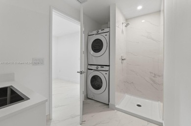 Welcome to luxury living in the sky! This brand-new corner unit