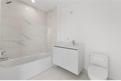 Welcome to luxury living in the sky! This brand-new corner unit