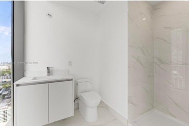 Welcome to luxury living in the sky! This brand-new corner unit