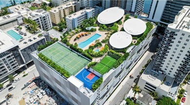 Welcome to luxury living in the sky! This brand-new corner unit