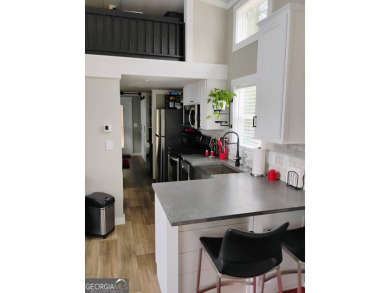 Welcome to the upgraded *Seashore* Tiny Home, a beautifully