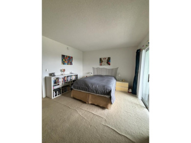 Serene 55+ community of Regal Palms! This third-floor unit