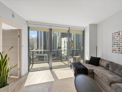 High above Brickell, this stunning SLS LUX residence offers a