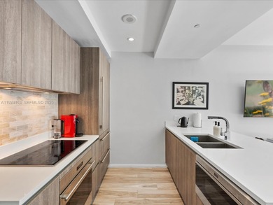 High above Brickell, this stunning SLS LUX residence offers a