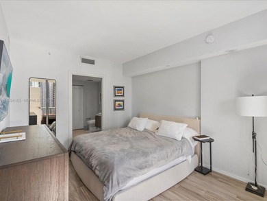 High above Brickell, this stunning SLS LUX residence offers a