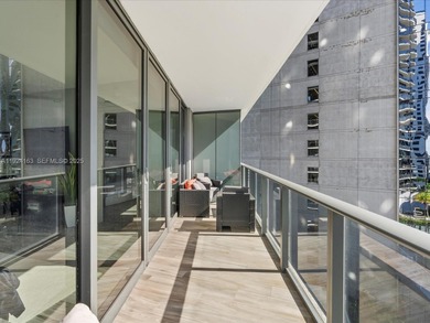 High above Brickell, this stunning SLS LUX residence offers a