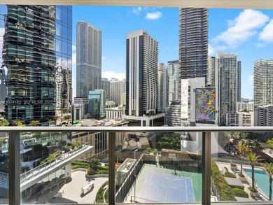 High above Brickell, this stunning SLS LUX residence offers a