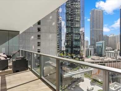 High above Brickell, this stunning SLS LUX residence offers a