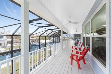 Completed in 2021, this CUSTOM-DESIGNED WATERFRONT RETREAT