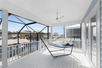 Completed in 2021, this CUSTOM-DESIGNED WATERFRONT RETREAT