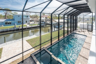 Completed in 2021, this CUSTOM-DESIGNED WATERFRONT RETREAT