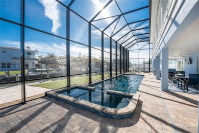 Completed in 2021, this CUSTOM-DESIGNED WATERFRONT RETREAT