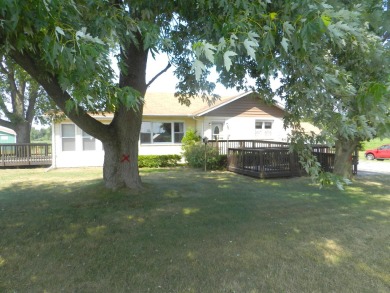 This 3 bedroom 1 bathroom home sits on over an acre of country