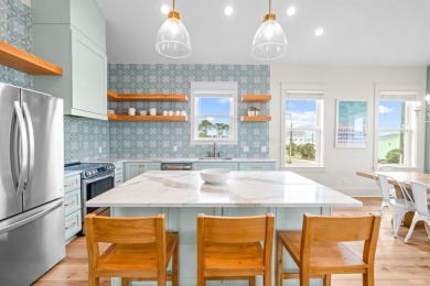 This 5 bedroom, 4 bathroom coastal home by Ben Wortman