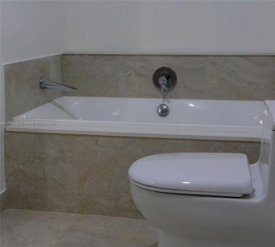 Waterfront apartment with spacious 2-bed, 3 Full Baths + DEN