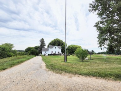 Craft Your Dream on 23.74 Acres: Farmhouse & Potential Pond!