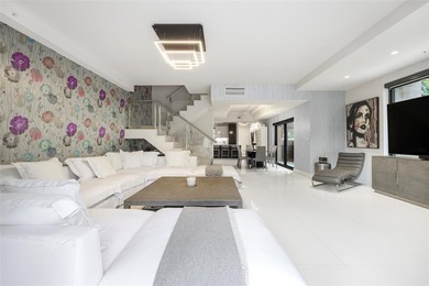 Beach-chic 2-story contemporary glass wrapped corner residence