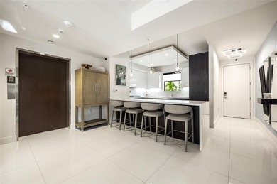 Beach-chic 2-story contemporary glass wrapped corner residence