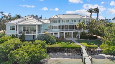 2 DEEP-WATER DOCKS AND A COVERED 10,000 LB LIFT. 5 BEDROOMS AND