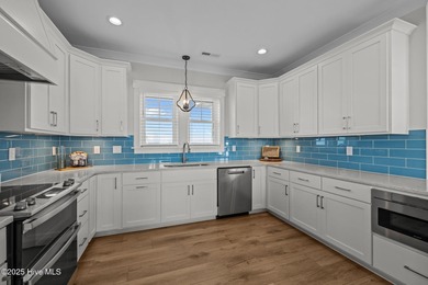 Income producing property! This is the epitome of coastal living