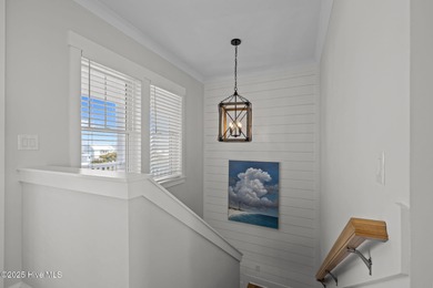 Income producing property! This is the epitome of coastal living