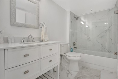 Stunning, fully remodeled condo with lake view--where no detail