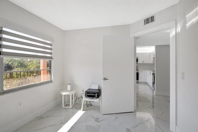 Stunning, fully remodeled condo with lake view--where no detail