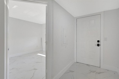 Stunning, fully remodeled condo with lake view--where no detail