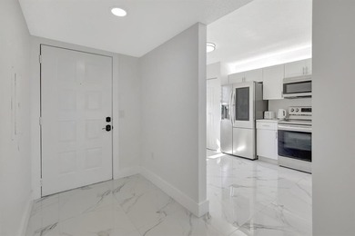 Stunning, fully remodeled condo with lake view--where no detail
