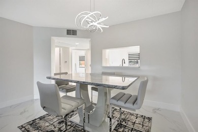 Stunning, fully remodeled condo with lake view--where no detail