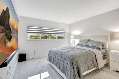 Stunning, fully remodeled condo with lake view--where no detail