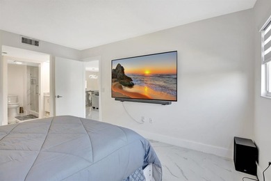 Stunning, fully remodeled condo with lake view--where no detail