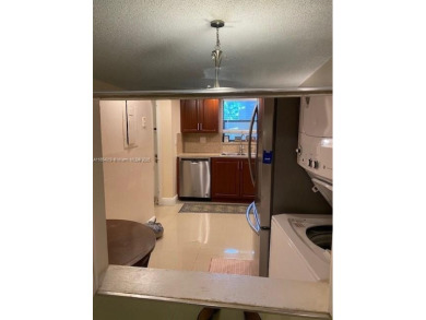 Large 2-bedroom 2-bathroom condominium on the golf course. Guard