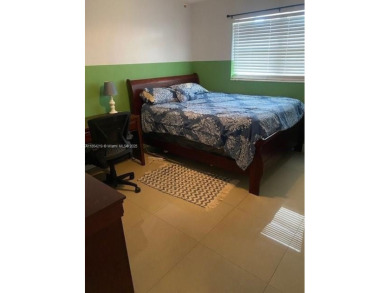 Large 2-bedroom 2-bathroom condominium on the golf course. Guard