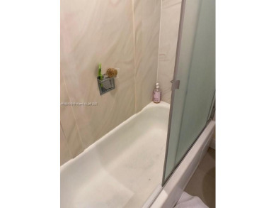 Large 2-bedroom 2-bathroom condominium on the golf course. Guard