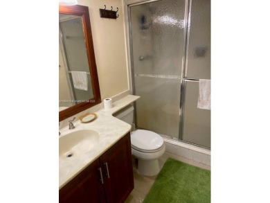 Large 2-bedroom 2-bathroom condominium on the golf course. Guard