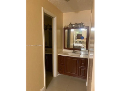 Large 2-bedroom 2-bathroom condominium on the golf course. Guard