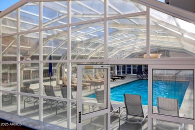 1 Bedroom + Den Condo in a Resort-Style Gated Community! This