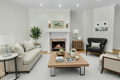 Discover timeless elegance in this custom brick home nestled in