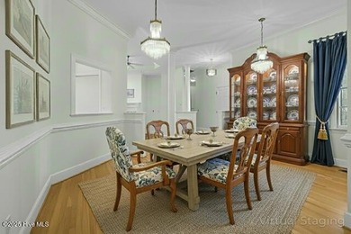 Discover timeless elegance in this custom brick home nestled in