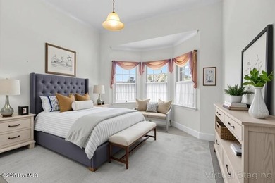 Discover timeless elegance in this custom brick home nestled in