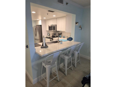 PARADISE! GORGEOUS FIRST FLOOR 2/2 RENOVATED BEACH HOUSE CONDO