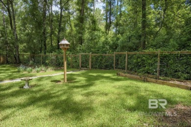 Located just one mile from downtown Fairhope, this 4BR/3.5BA