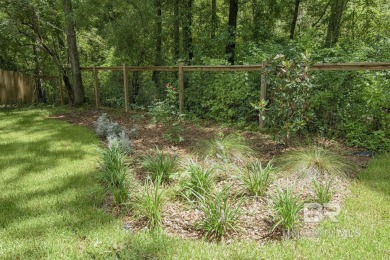 Located just one mile from downtown Fairhope, this 4BR/3.5BA