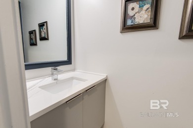 Located just one mile from downtown Fairhope, this 4BR/3.5BA